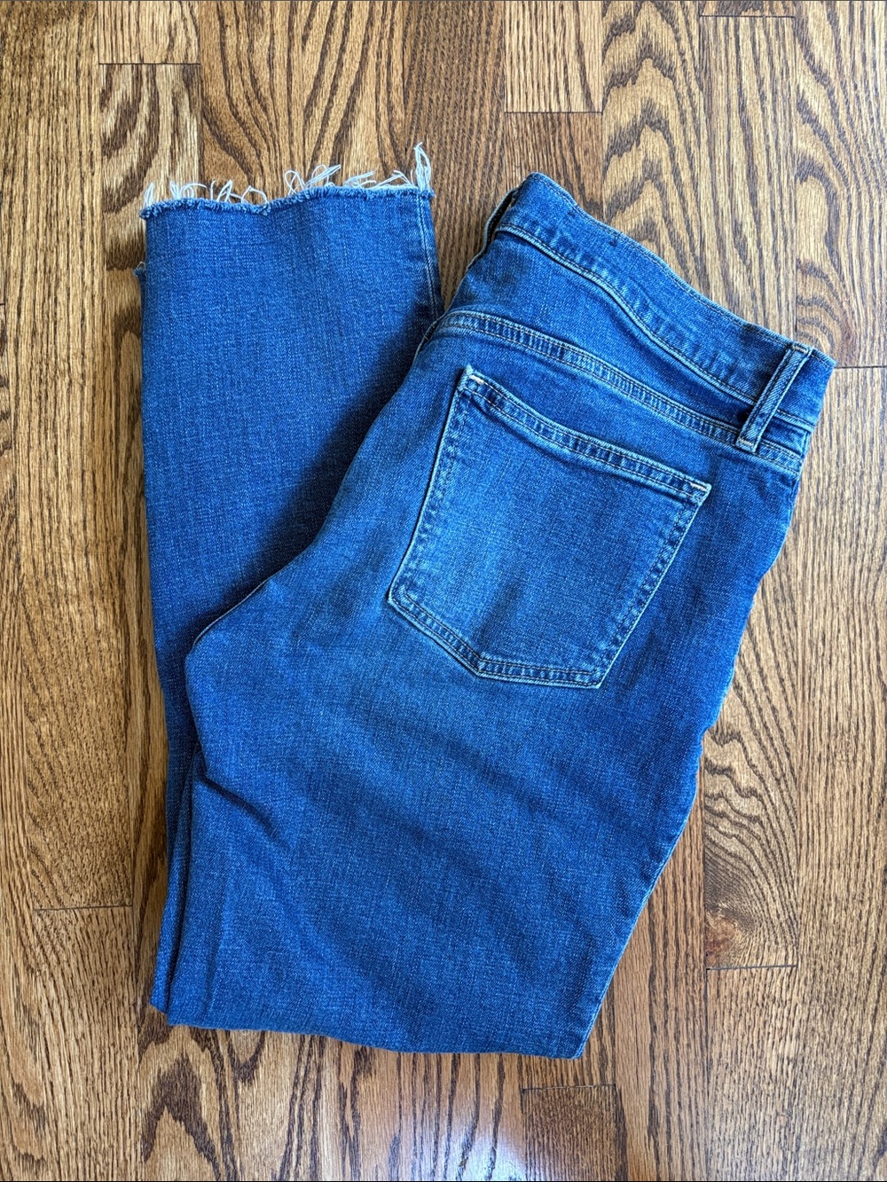 GAP Women's distressed medium wash, medium rise girlfriend jeans, size 29/8.